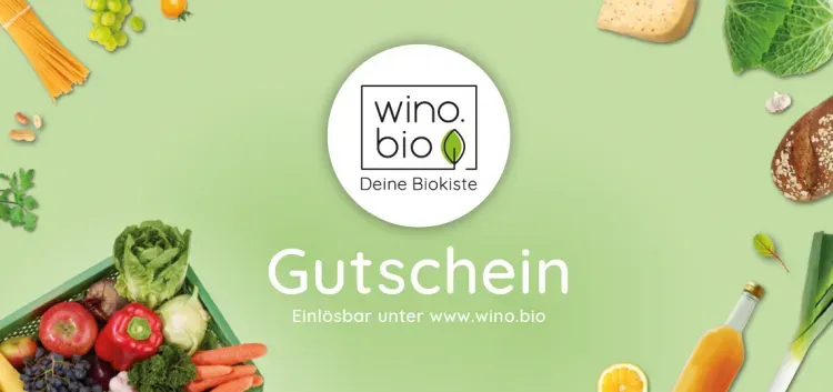 Gutschein von wino.bio mit frischem Bio-Obst, Gemüse, Brot und Saft auf grünem Hintergrund